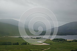 Clouds and mist over a stream flowing into Loch BÃÂ  in the West Highlands of Scotland